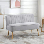 Light grey velvet two-seat sofa with vertical channel back and wooden legs