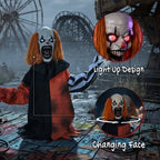 Halloween animatronic clown in black-and-orange outfit with red glowing eyes, waving hand