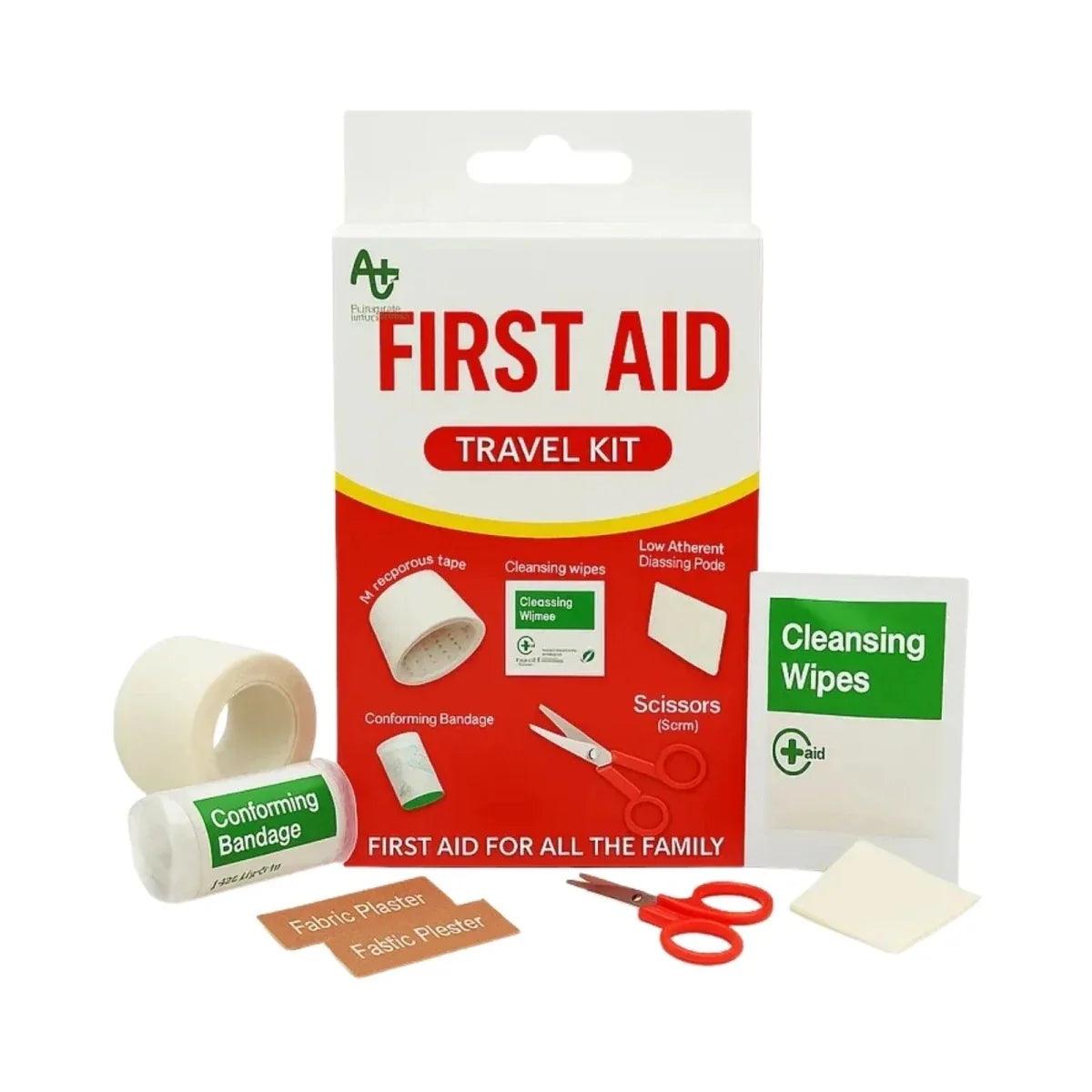 First aid travel kit with scissors, bandages, cleansing wipes, and dressing pads