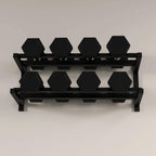 Wall-mounted two-tier dumbbell rack displaying eight black hex dumbbells