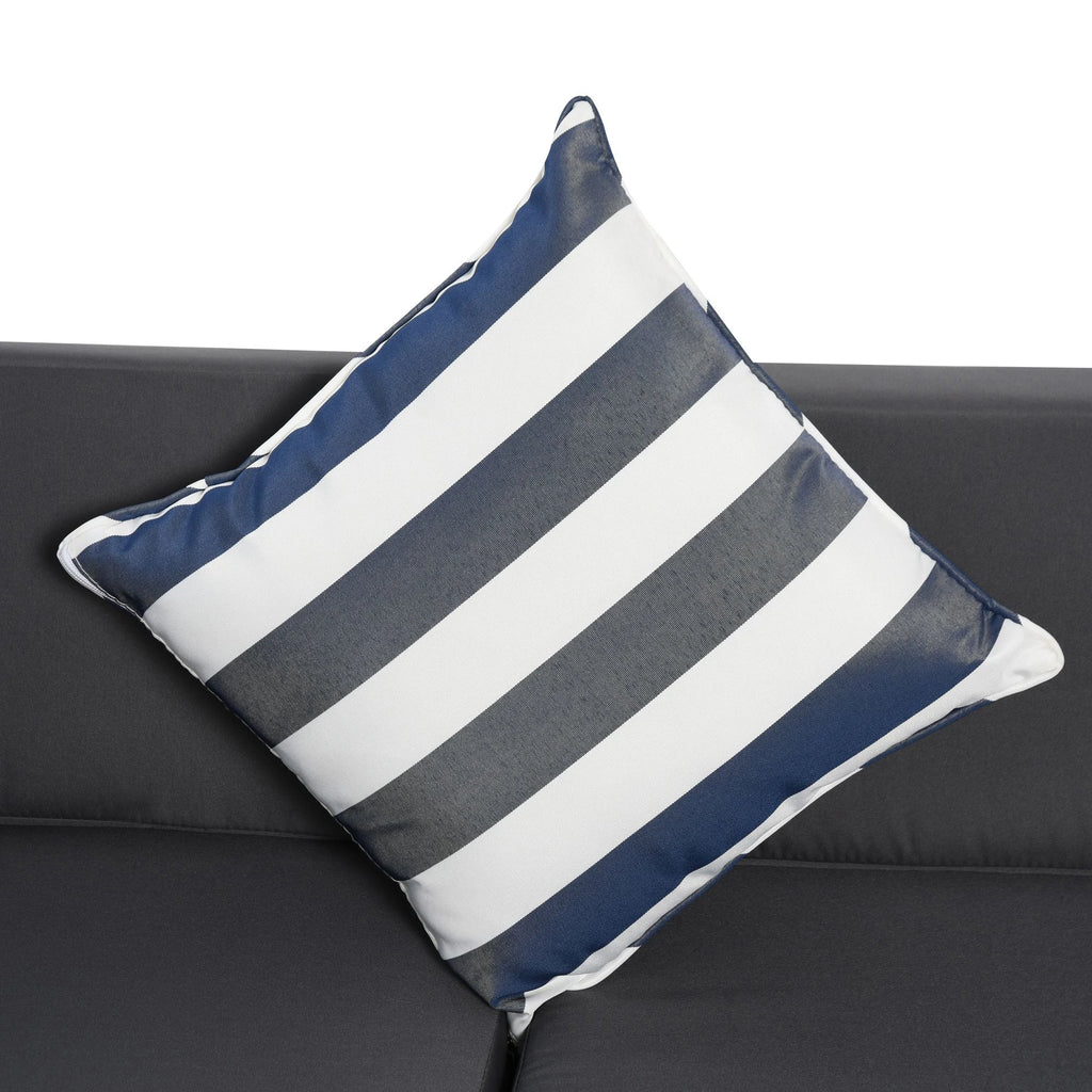 Blue and white striped cushion on a dark sofa seat