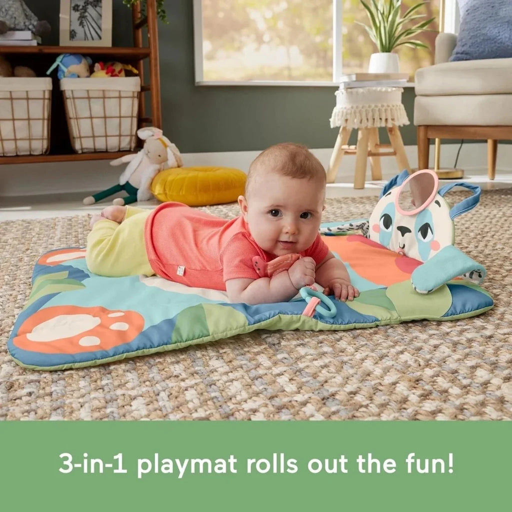 Baby lying on panda playmat with hanging toys and patterned play surface