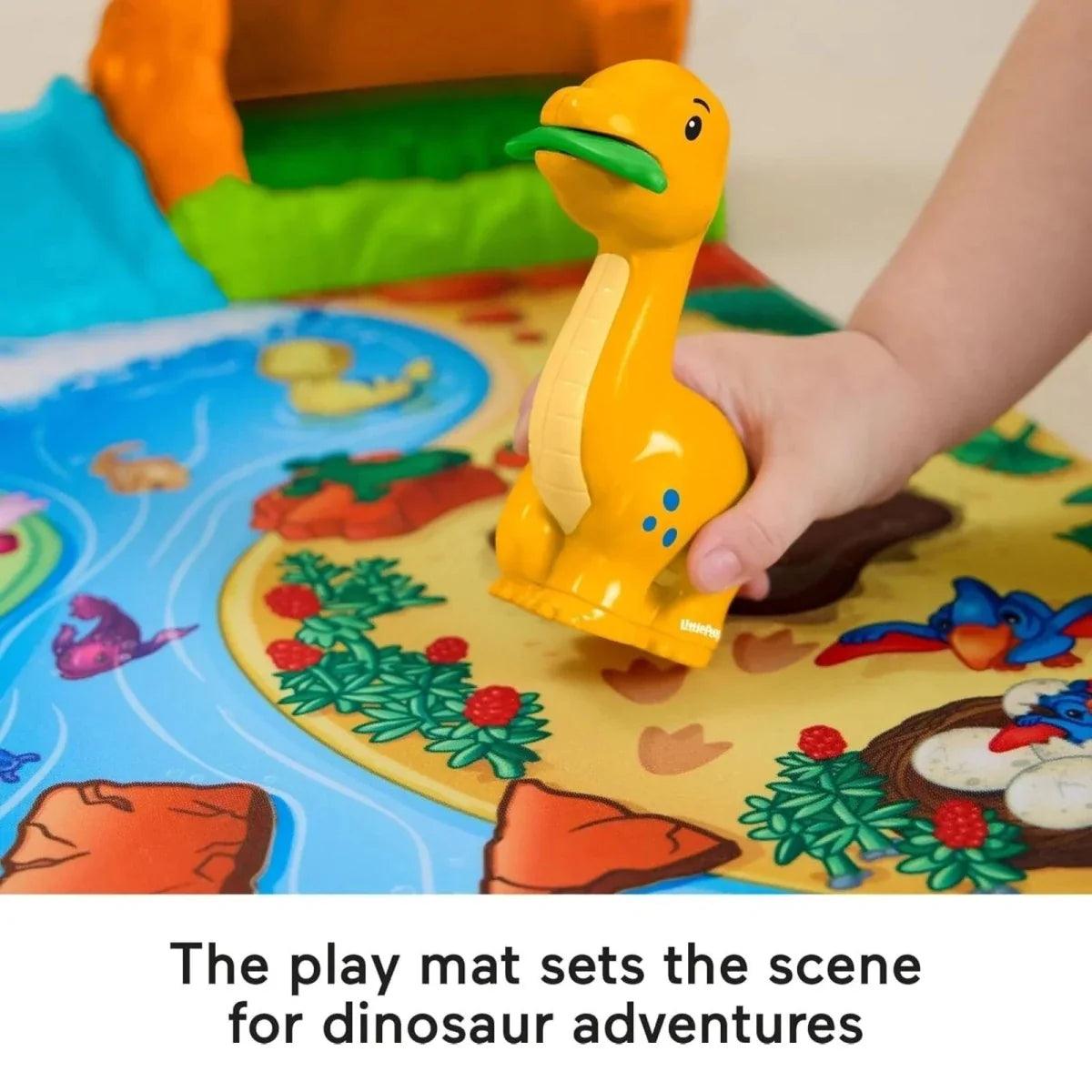 Yellow dinosaur toy figure on colorful prehistoric play mat
