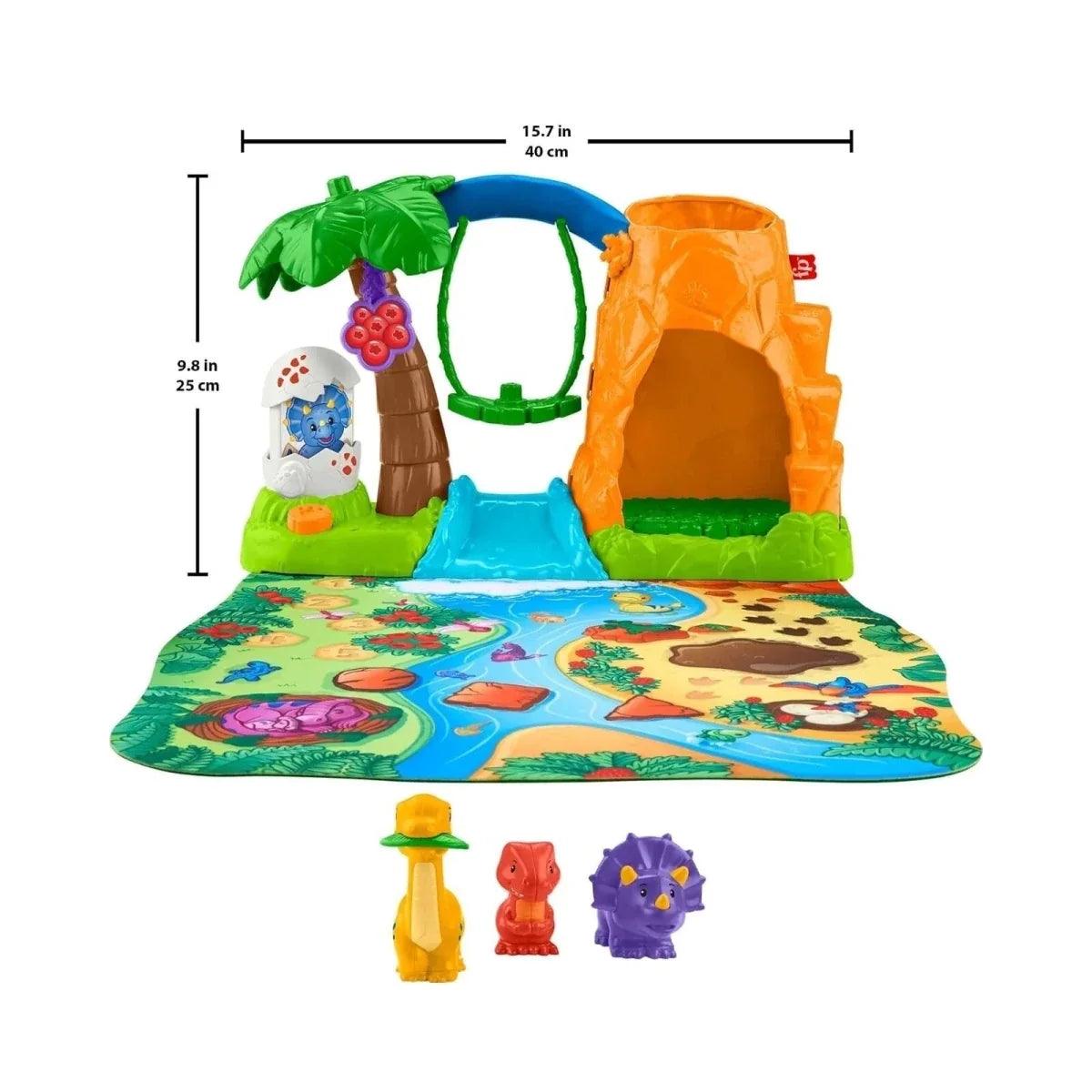 Dinosaur village playset with green tree, orange cave, and foldable play mat