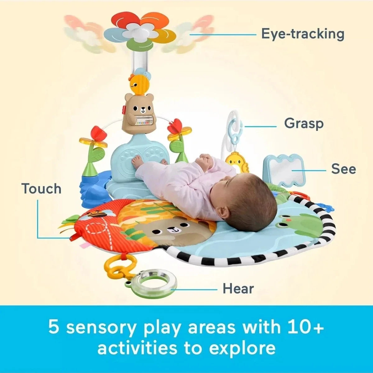 Baby activity gym with sensory play mat, hanging mobile, and character console