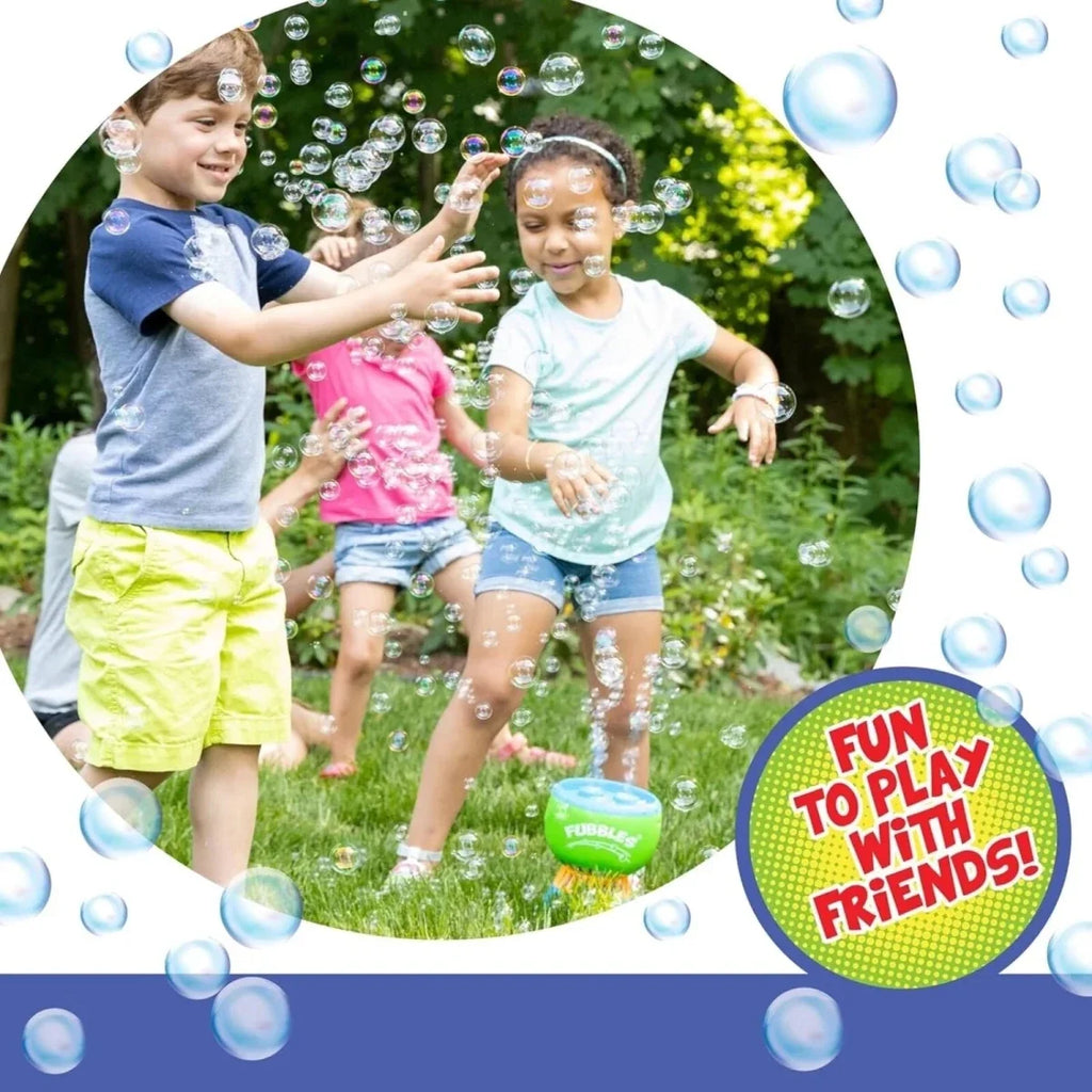 No-spill bubble machine spraying bubbles outdoors as two kids play