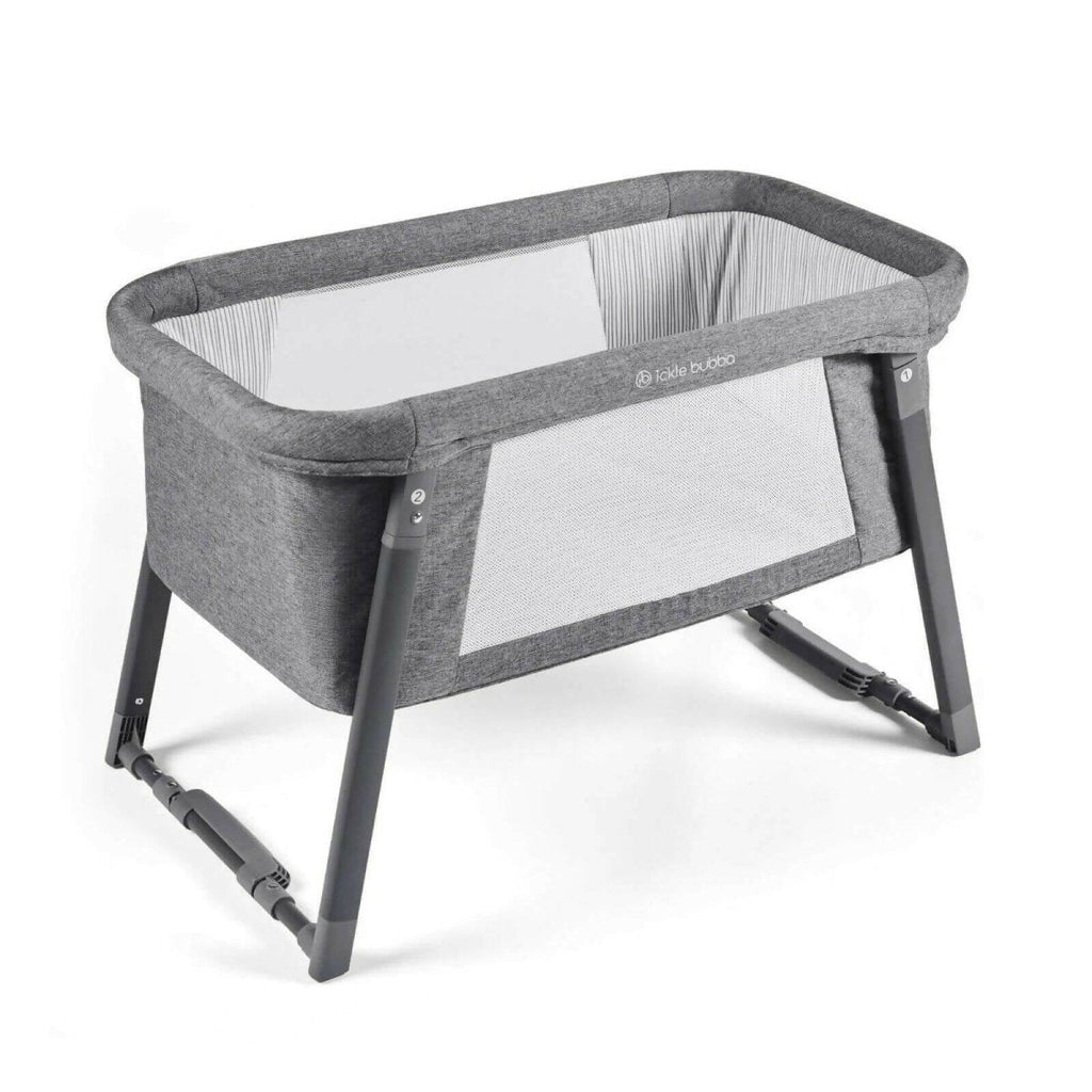 Space Grey mini crib with raised side panel and gray padded fabric canopy.
