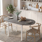 Grey drop-leaf dining table with white legs, oval tabletop for everyday meals