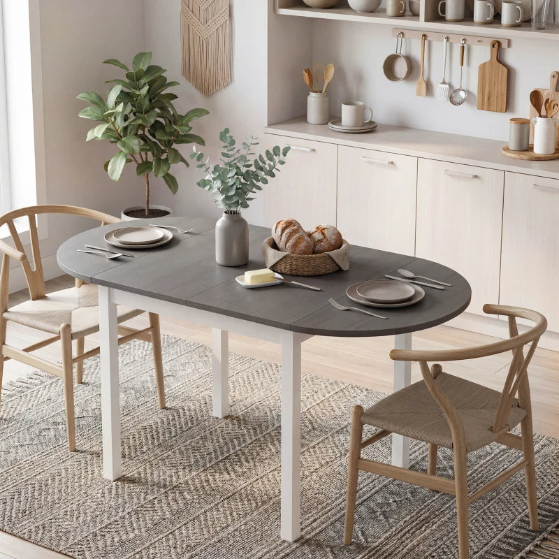 Grey drop-leaf dining table with white legs, oval tabletop for everyday meals