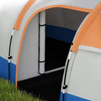 Close-up of orange and blue tunnel tent doorway with gray door and black floor