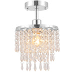 Silver-tone ceiling light with clear crystal strands and dangling drops under round canopy