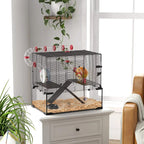 Black wire hamster cage with deep glass base, ramps, exercise wheel, and tunnels
