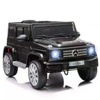 Black kids electric ride-on car, front grille with Mercedes emblem and glowing headlights