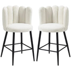 Set of 2 cream boucle bar stools with curved backs, black steel legs, and footrests