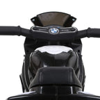 Kids electric ride-on motorbike dashboard with BMW emblem and black tinted windshield.