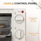 Cream mini oven control panel with temperature and timer knobs