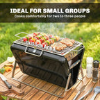 Portable charcoal grill with chrome grate, open lid, cooking area with assorted meat