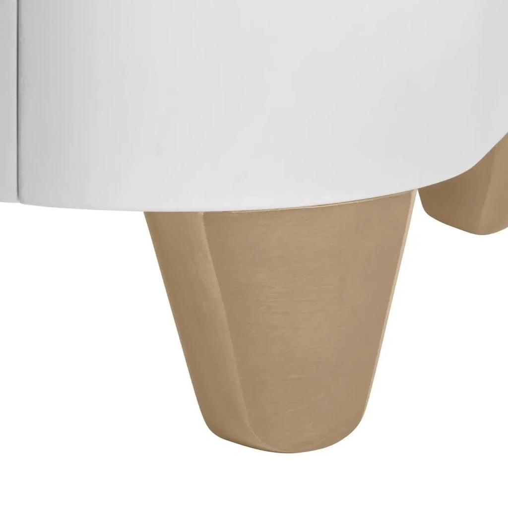 Natural wood-style legs attached to white cot bed base