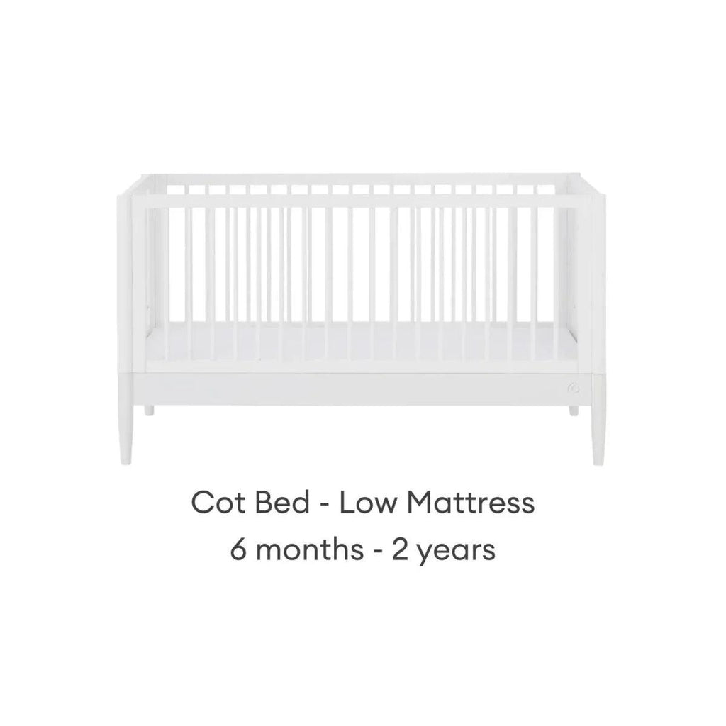 White cot bed with low mattress height, front view