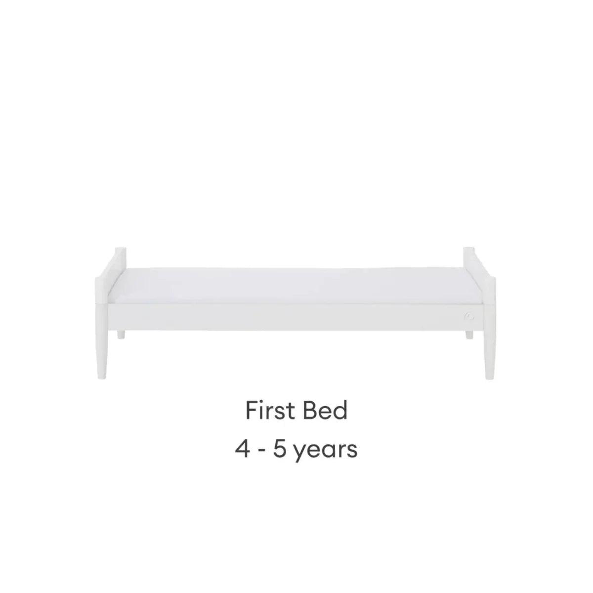 White first bed with low rails and flat mattress, front view