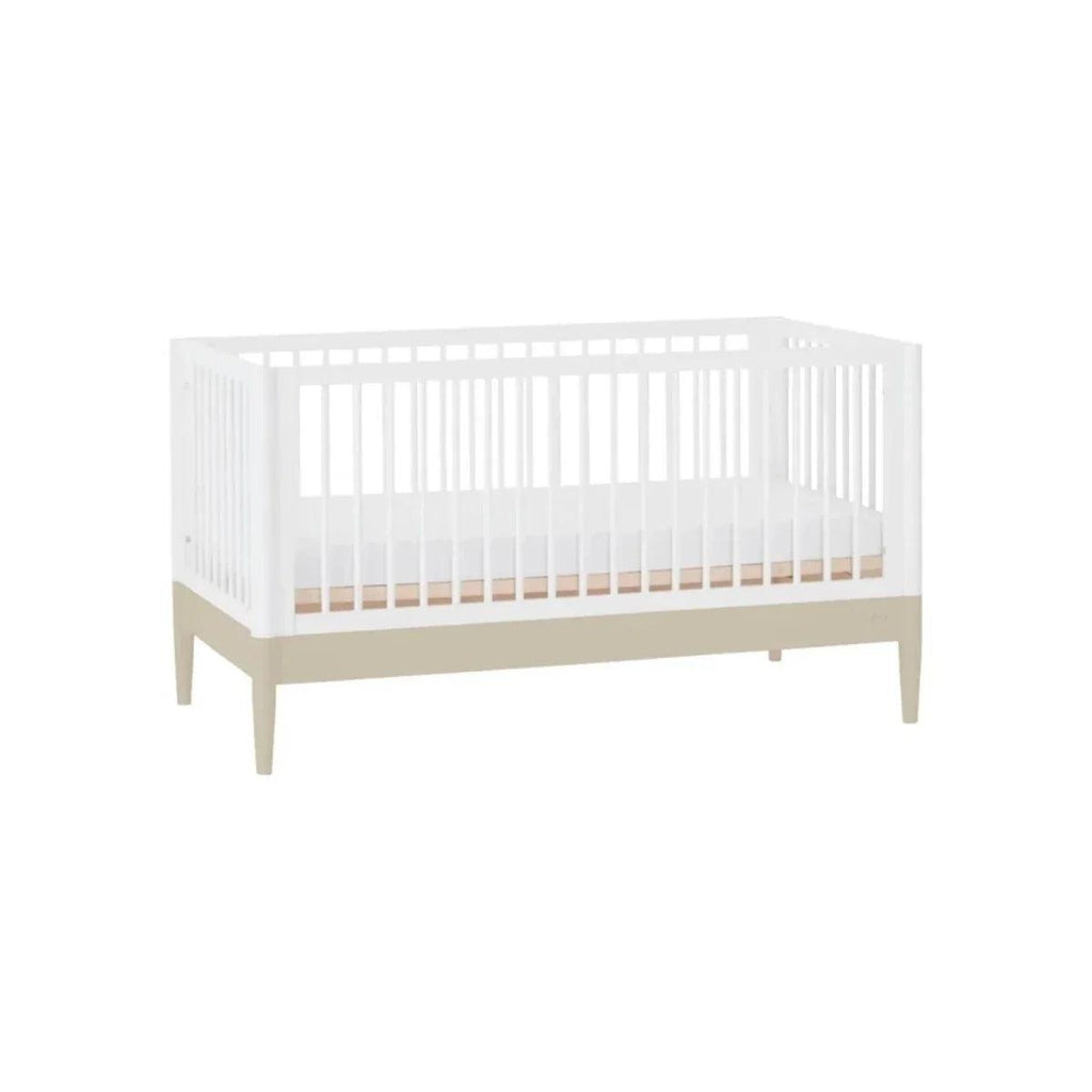 Baby crib in white with desert sage lower panel and vertical side slats