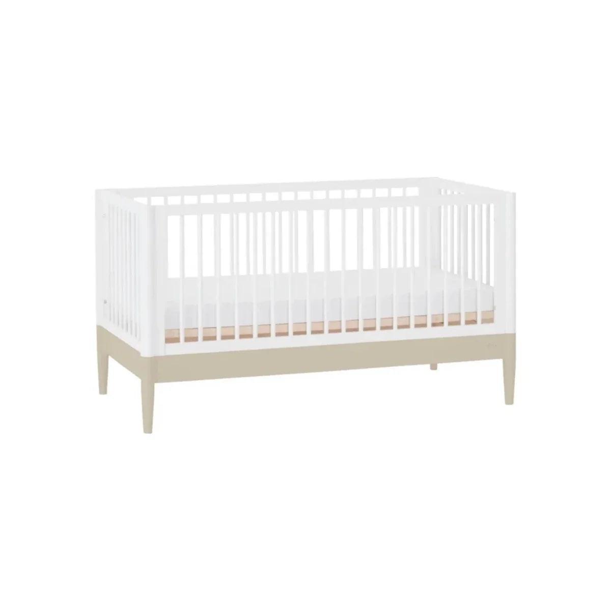 Baby crib in white with desert sage lower panel and vertical side slats