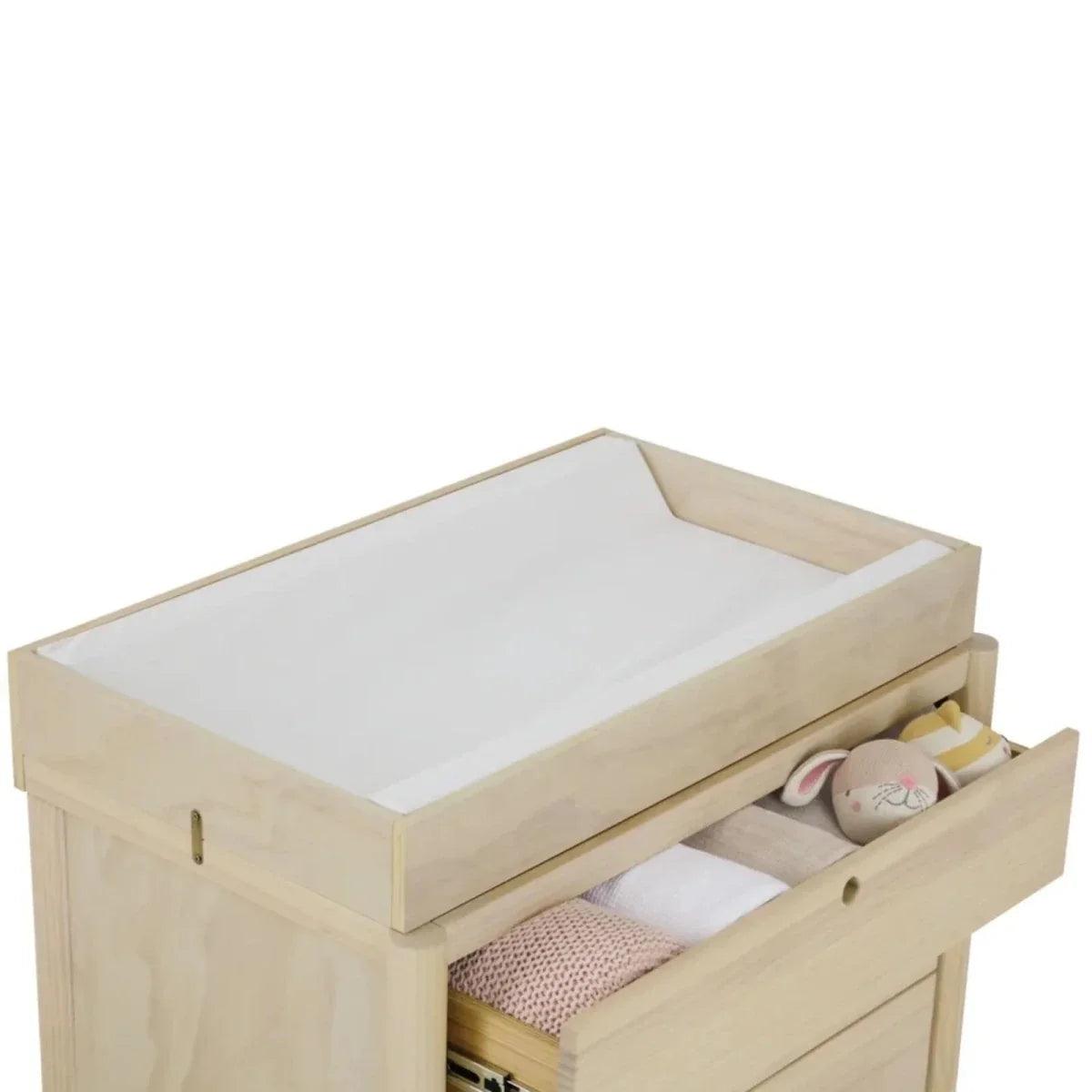 Wooden baby crib with open mattress area and side storage drawer, natural ash