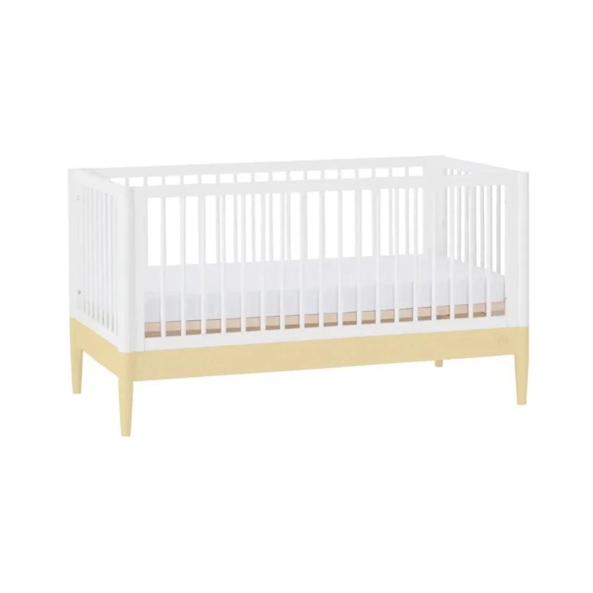 Baby crib, white slatted sides with primrose yellow legs