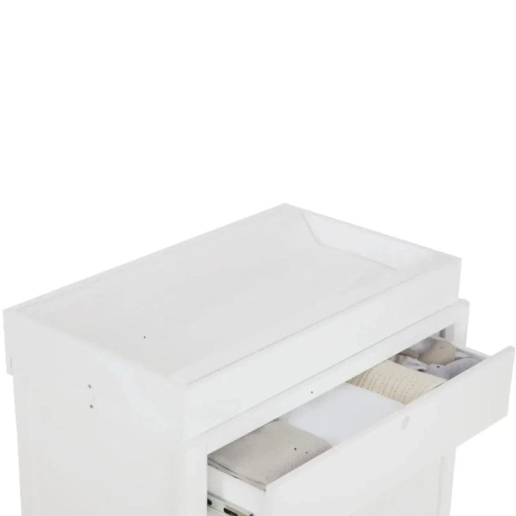 White baby crib with hinged top and open side storage