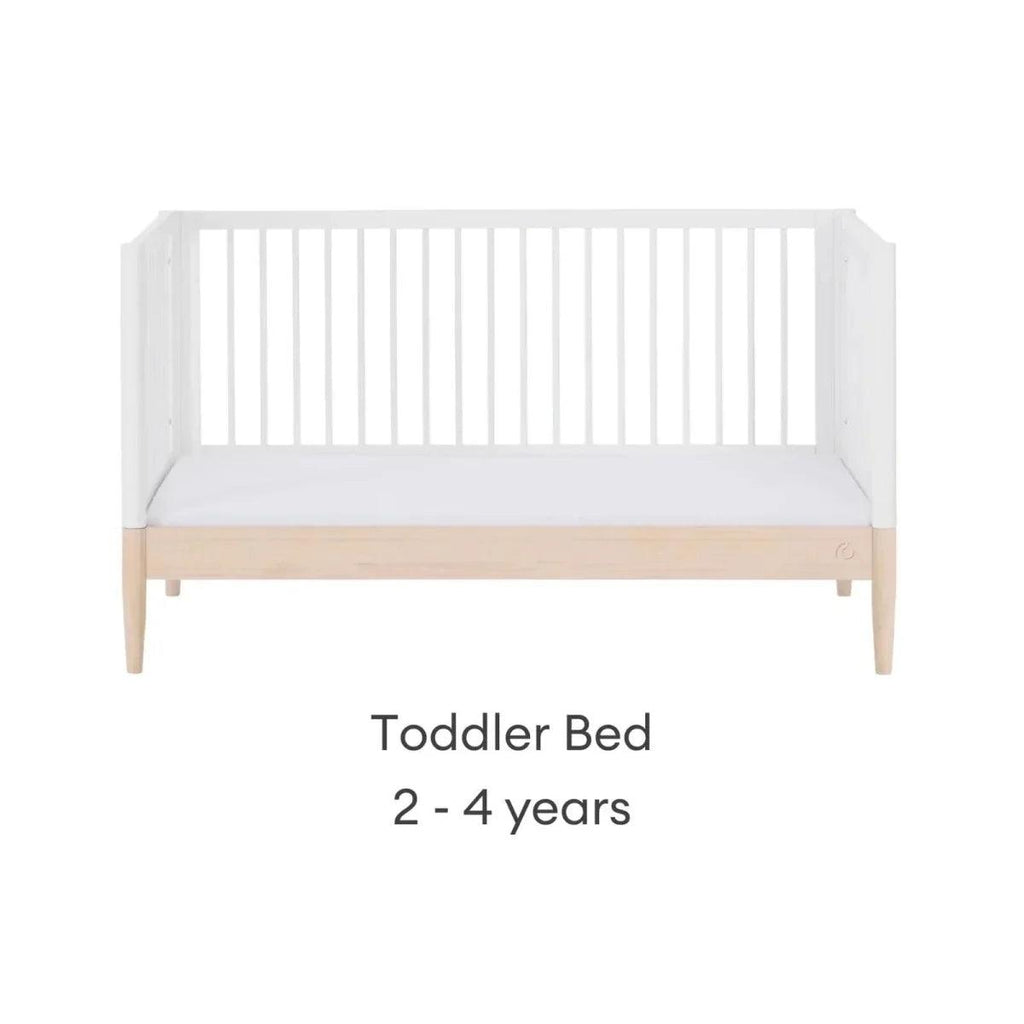 White toddler bed frame with natural base rail and side panels