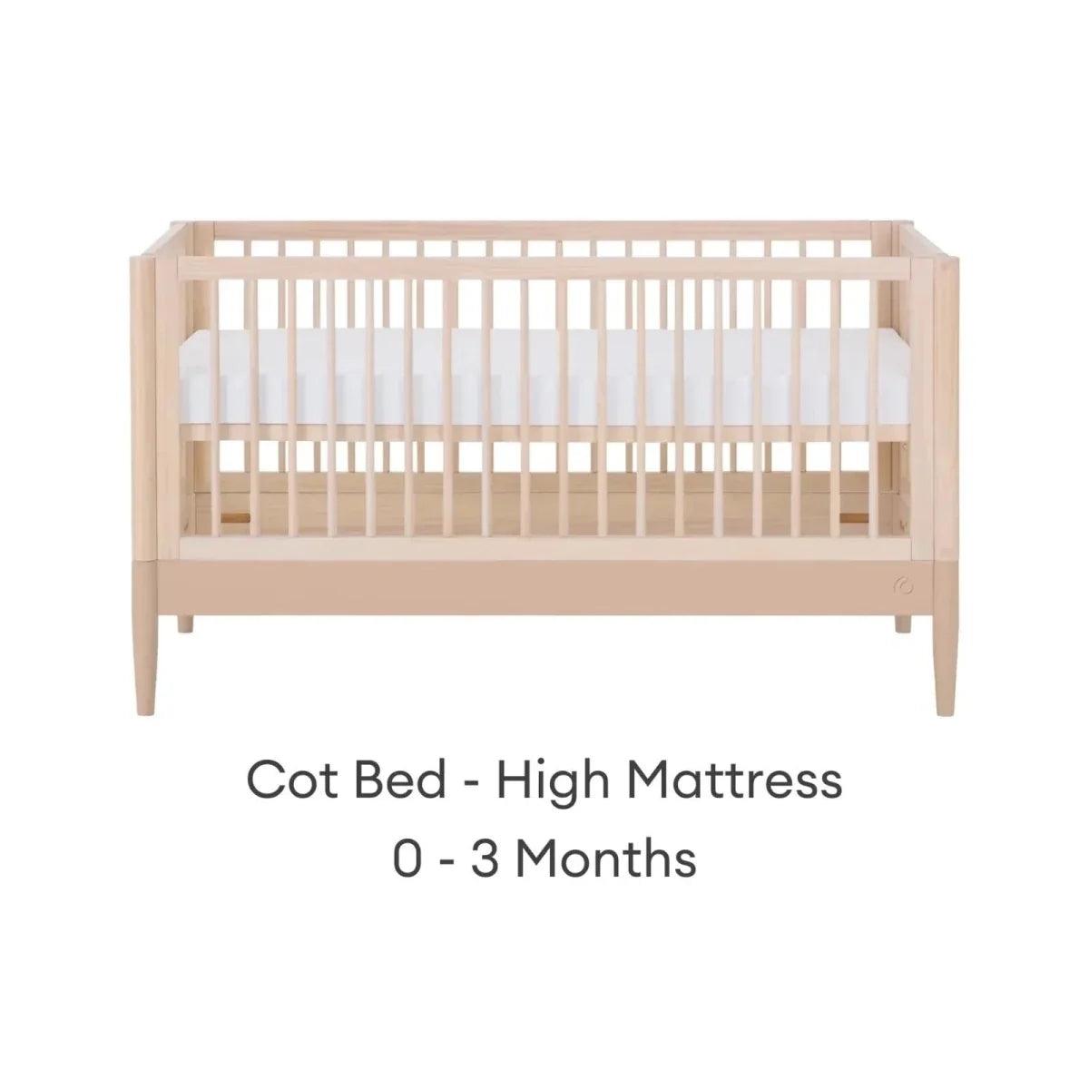 Light wood cot bed with high mattress setting, front view