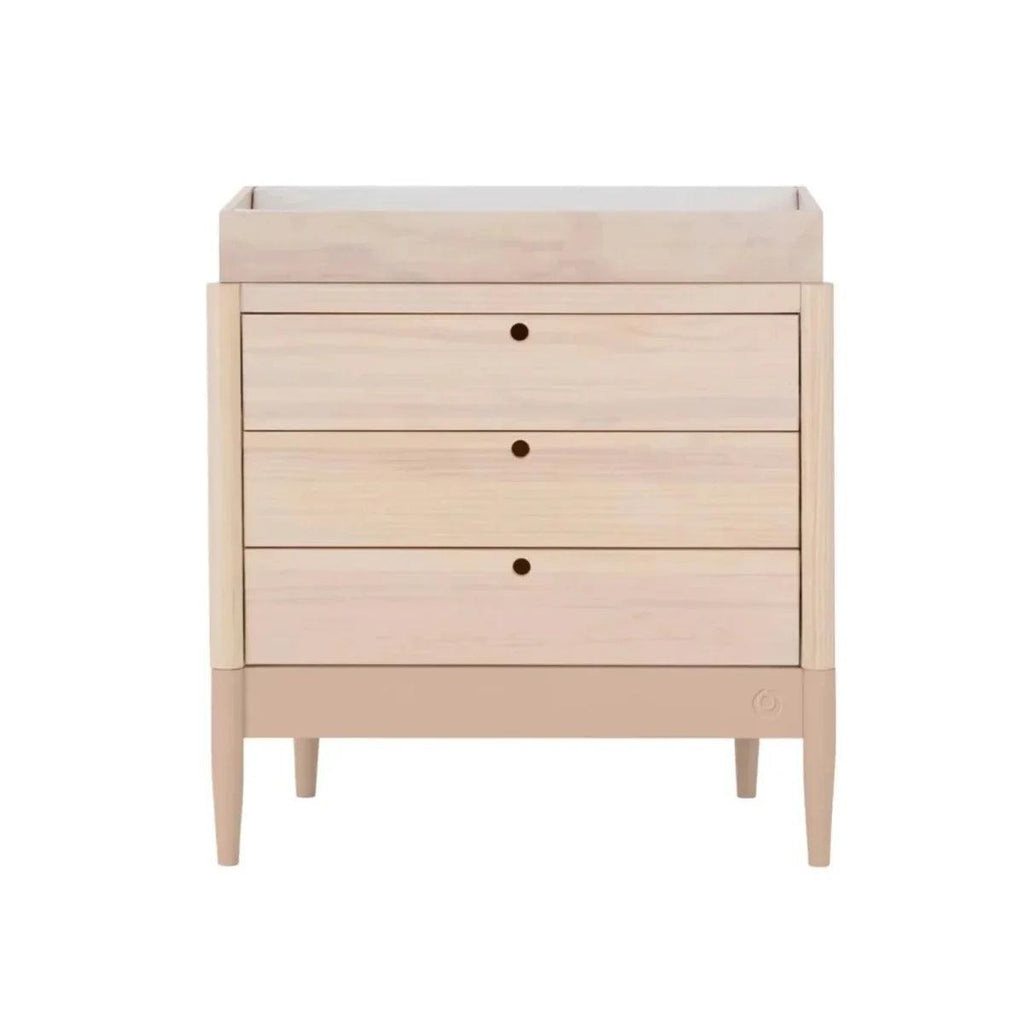 Light wood baby dresser with three drawers and changing top, three round knob pulls