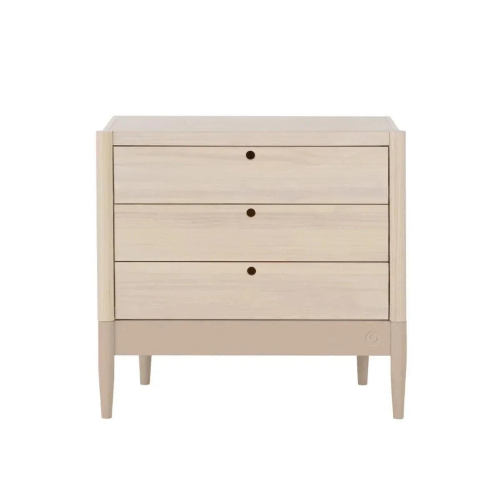 Light wood baby dresser with three drawers and changing top, three round knob pulls