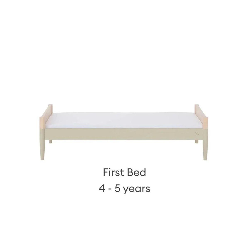 First bed conversion, natural wood frame with low desert sage base panel and legs