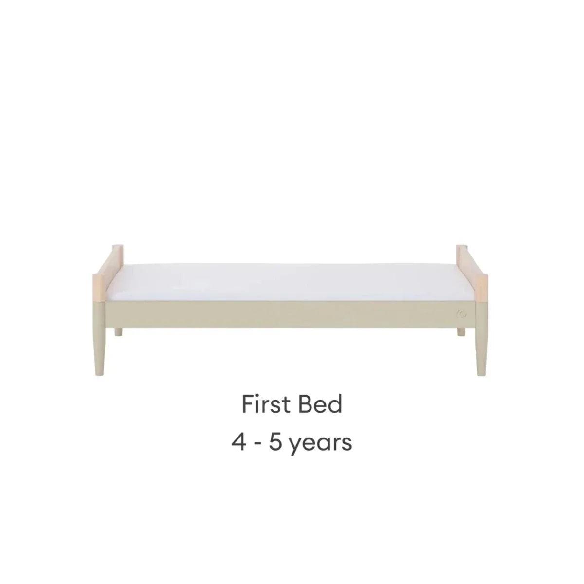 First bed conversion, natural wood frame with low desert sage base panel and legs