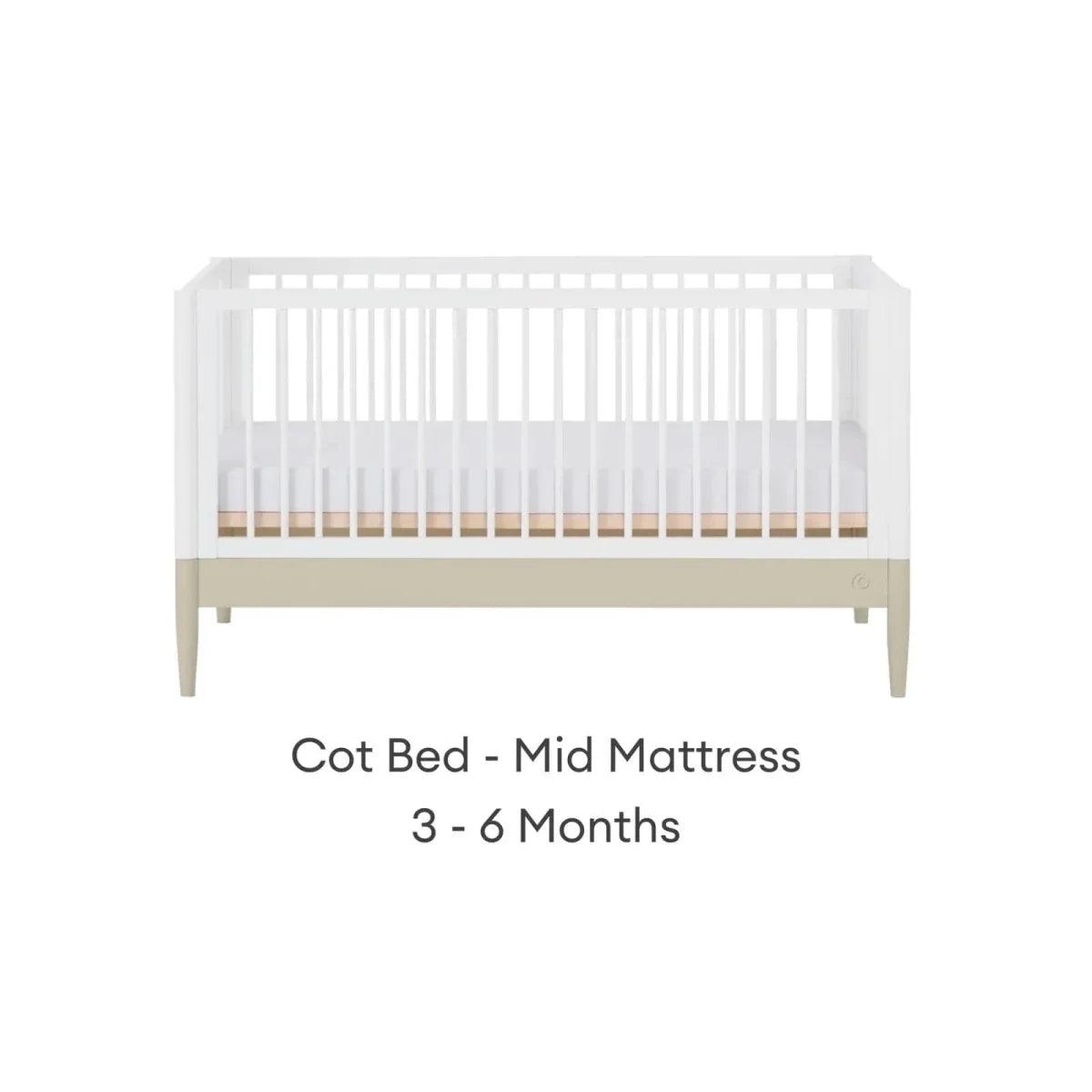 White cot bed with mid mattress position and vertical slat rail
