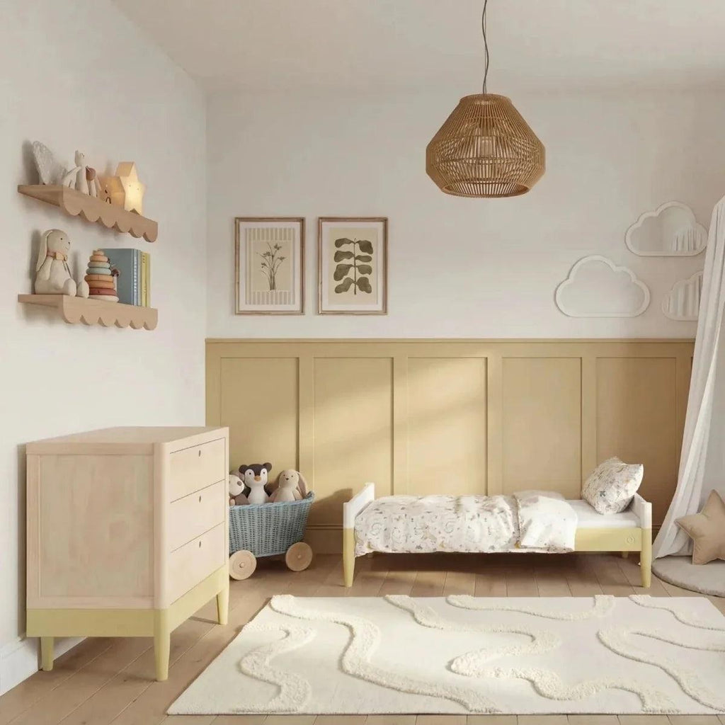 Primrose yellow and natural ash cot bed with vertical slats and front rail