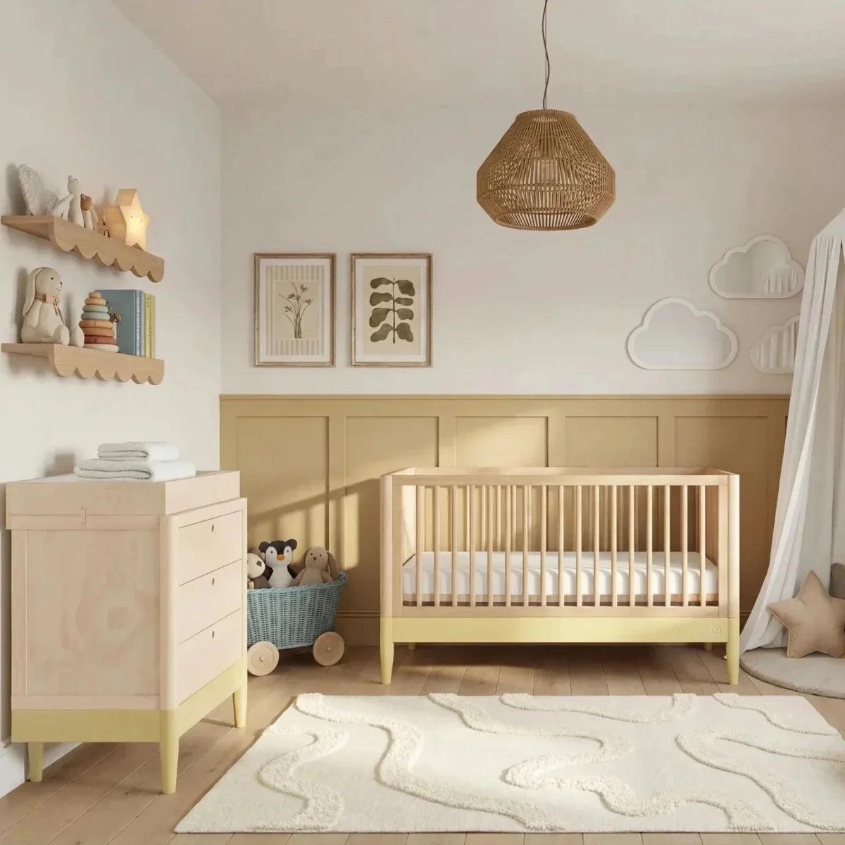Primrose yellow and natural ash cot bed with vertical slats and open end
