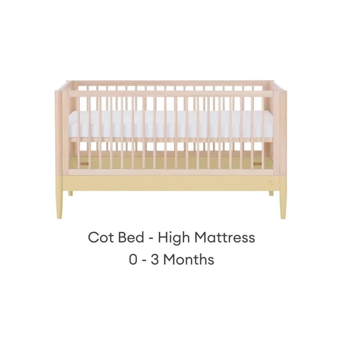 Cot bed frame in natural wood with primrose yellow panel and high mattress position