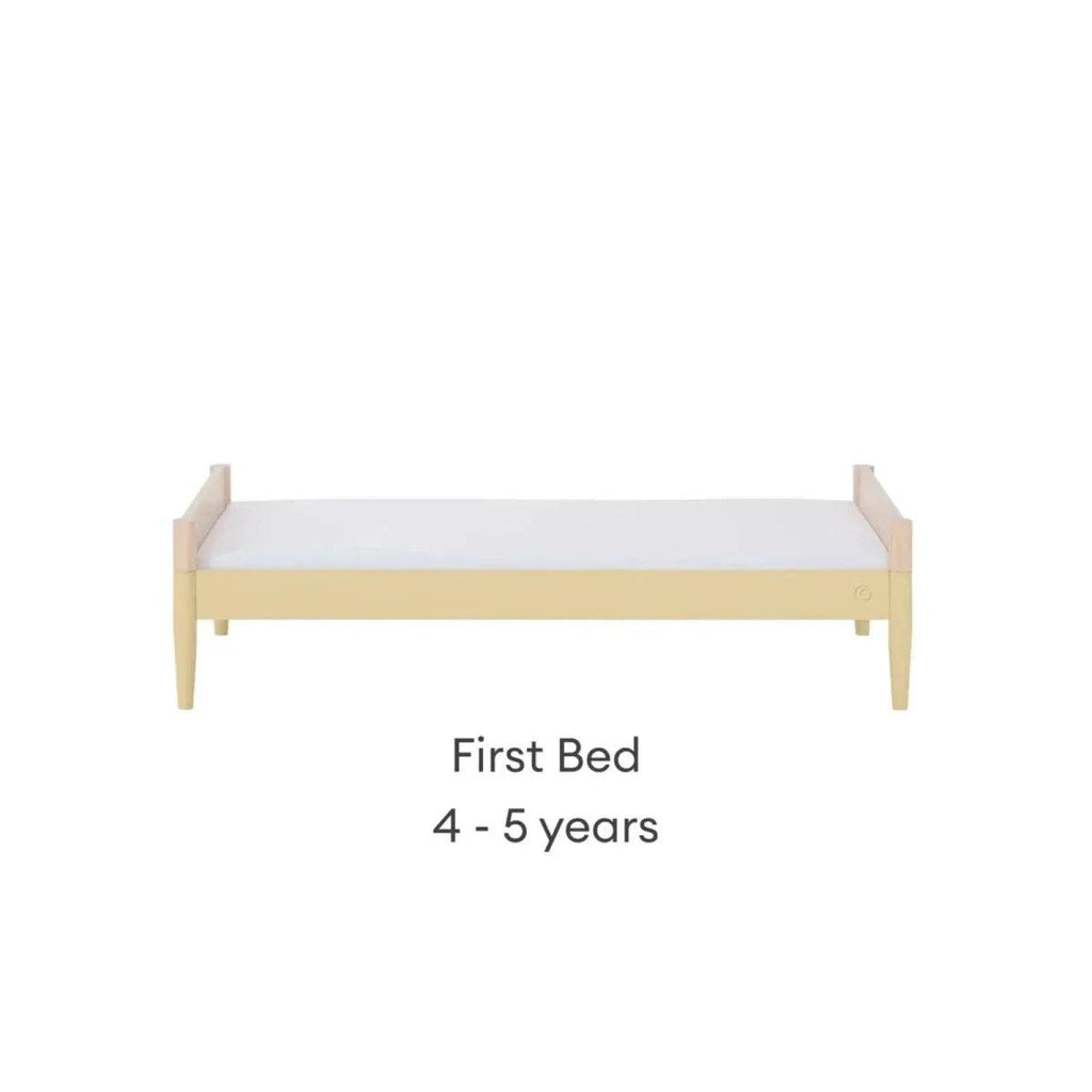 First bed frame in natural wood with primrose yellow base rail and low end panels