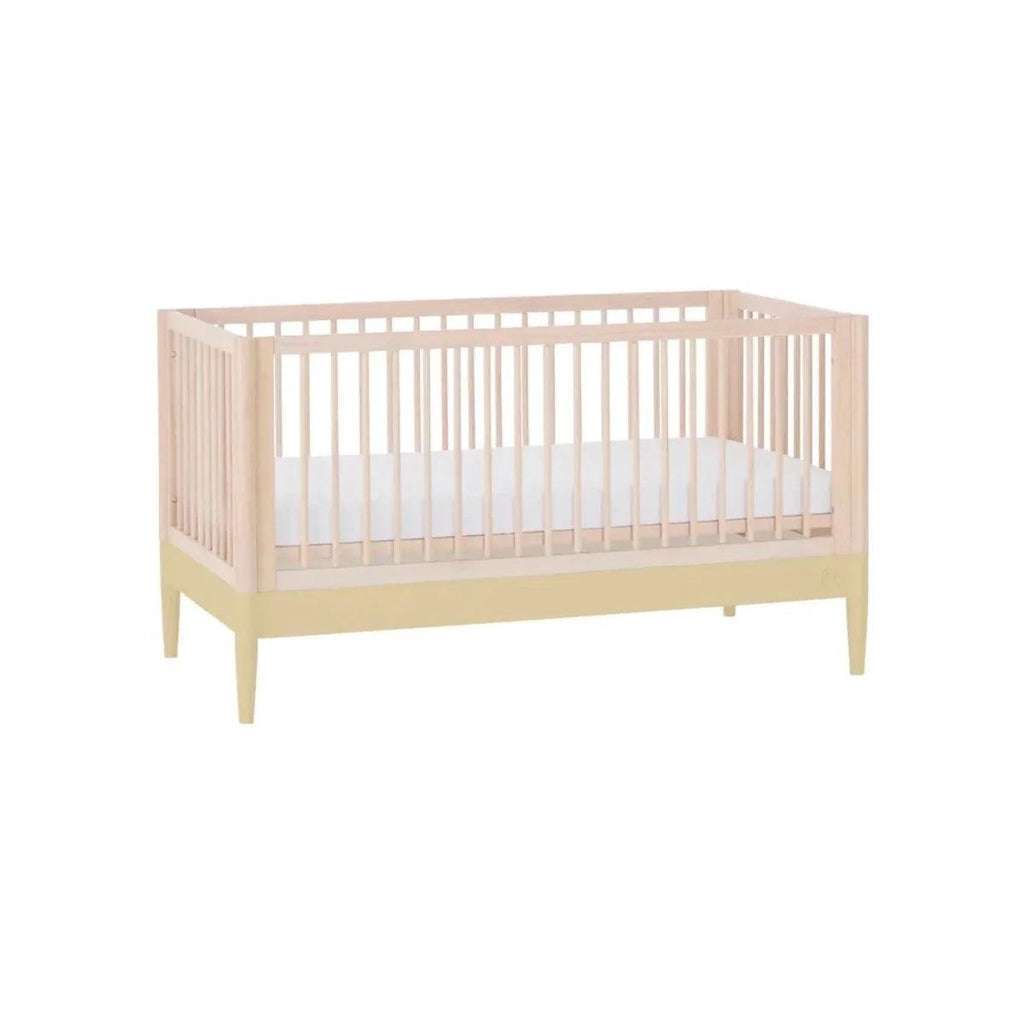 Convertible cot bed frame in natural wood with side rails and two-tone trim