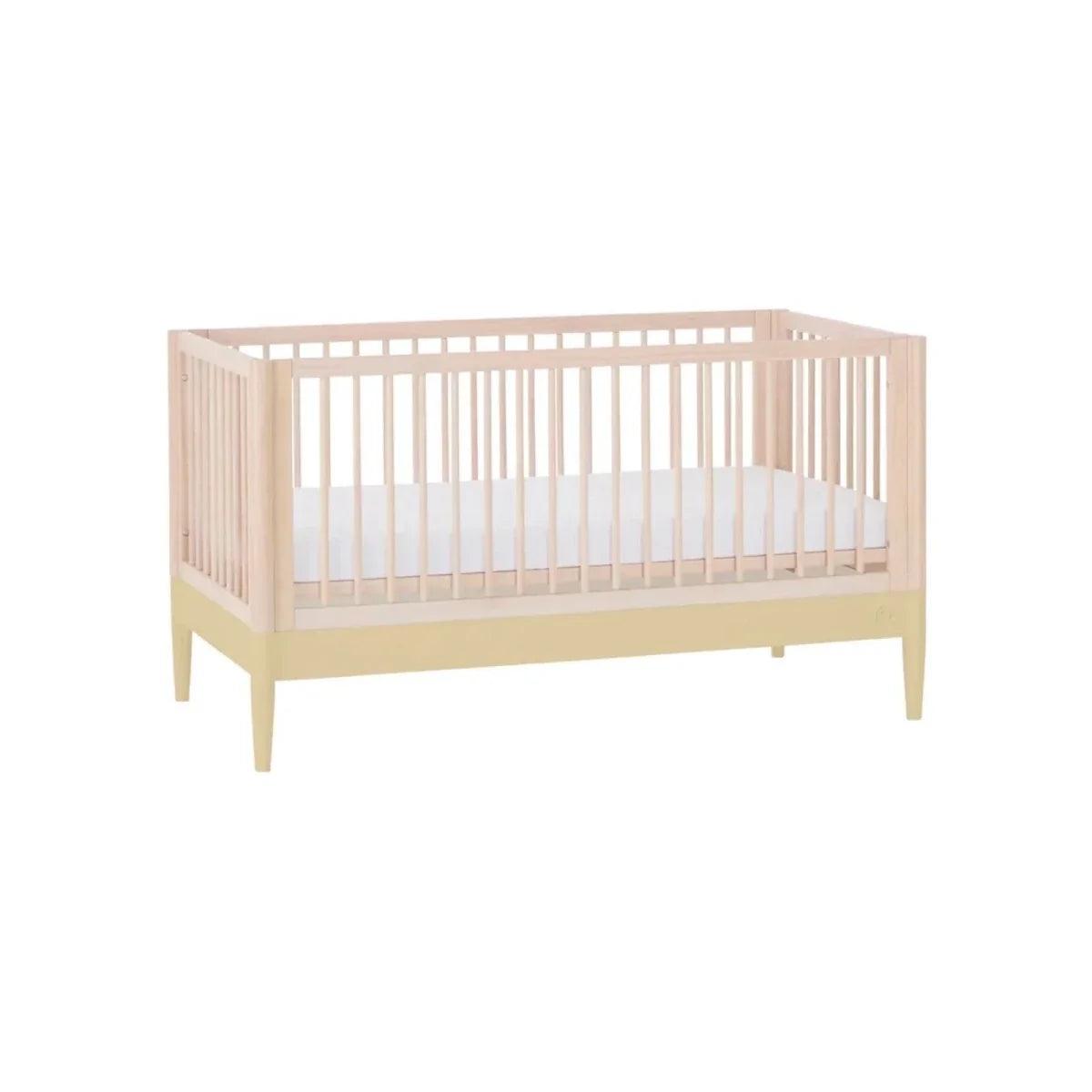 Convertible cot bed frame in natural wood with side rails and two-tone trim