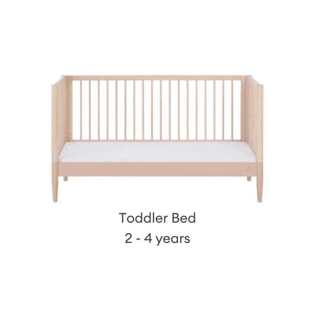 Gaia Baby Eos nursery cot bed in powder blush and natural ash, with raised side rails