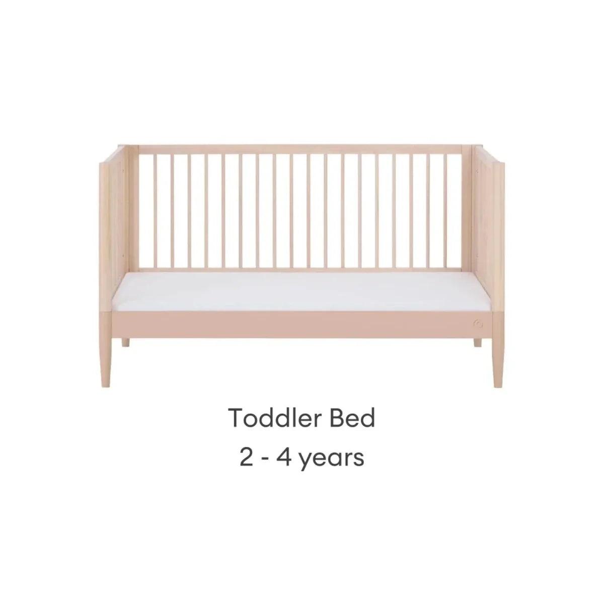 Gaia Baby Eos nursery cot bed in powder blush and natural ash, with raised side rails
