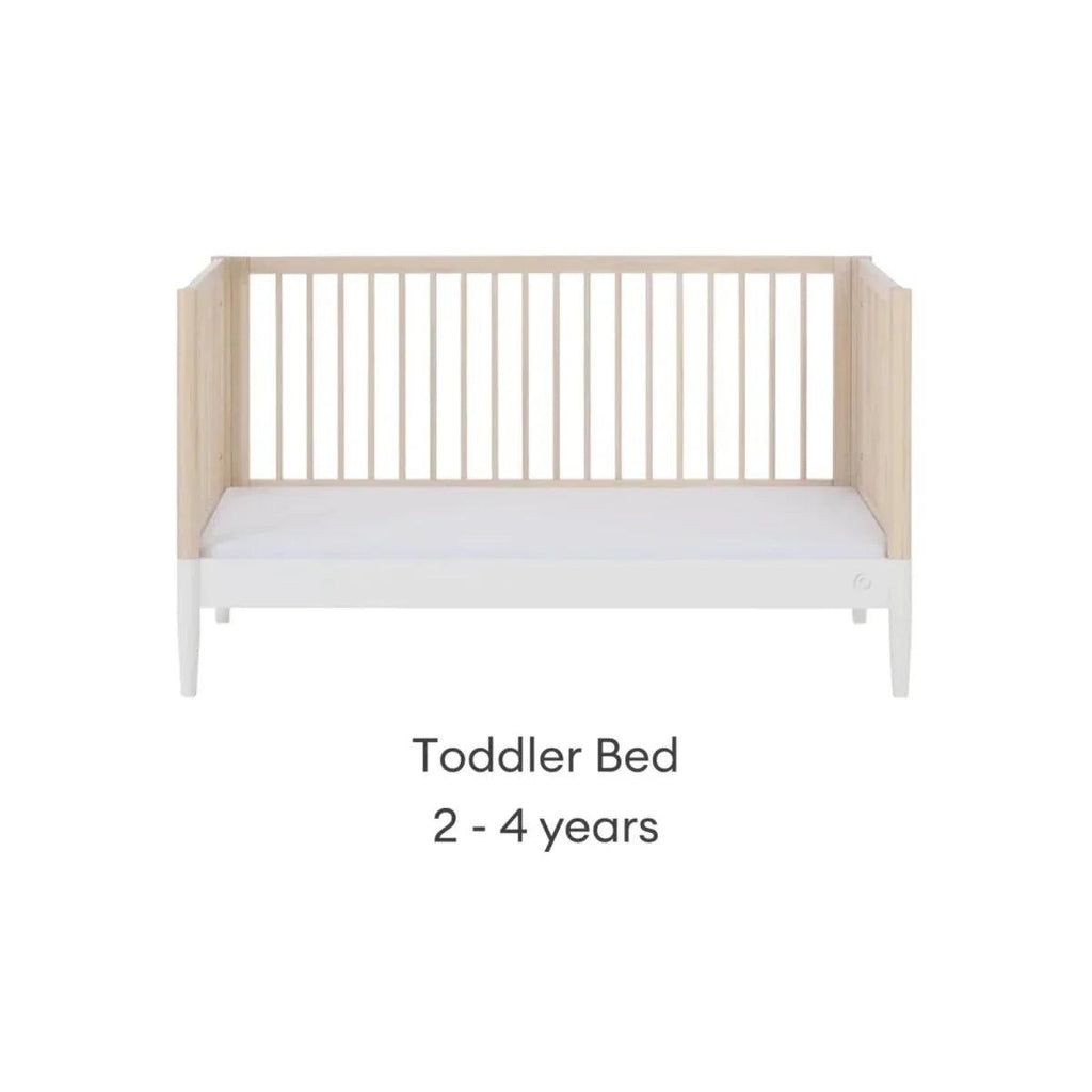 White and natural ash toddler bed with low guardrails and smooth front rail