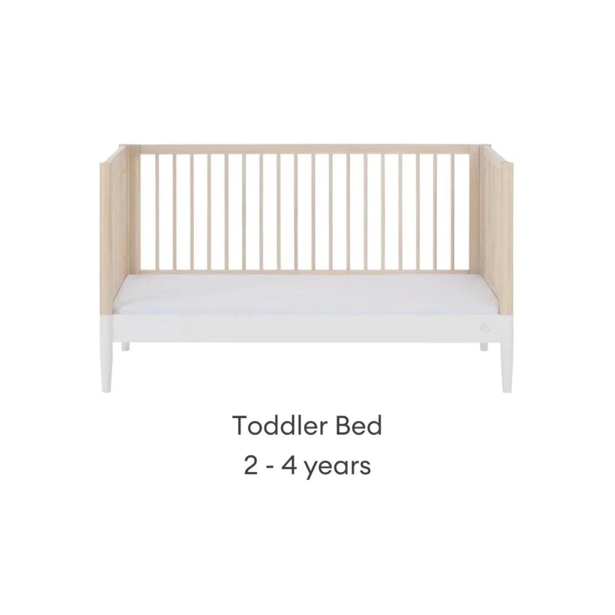 White and natural ash toddler bed with low guardrails and smooth front rail