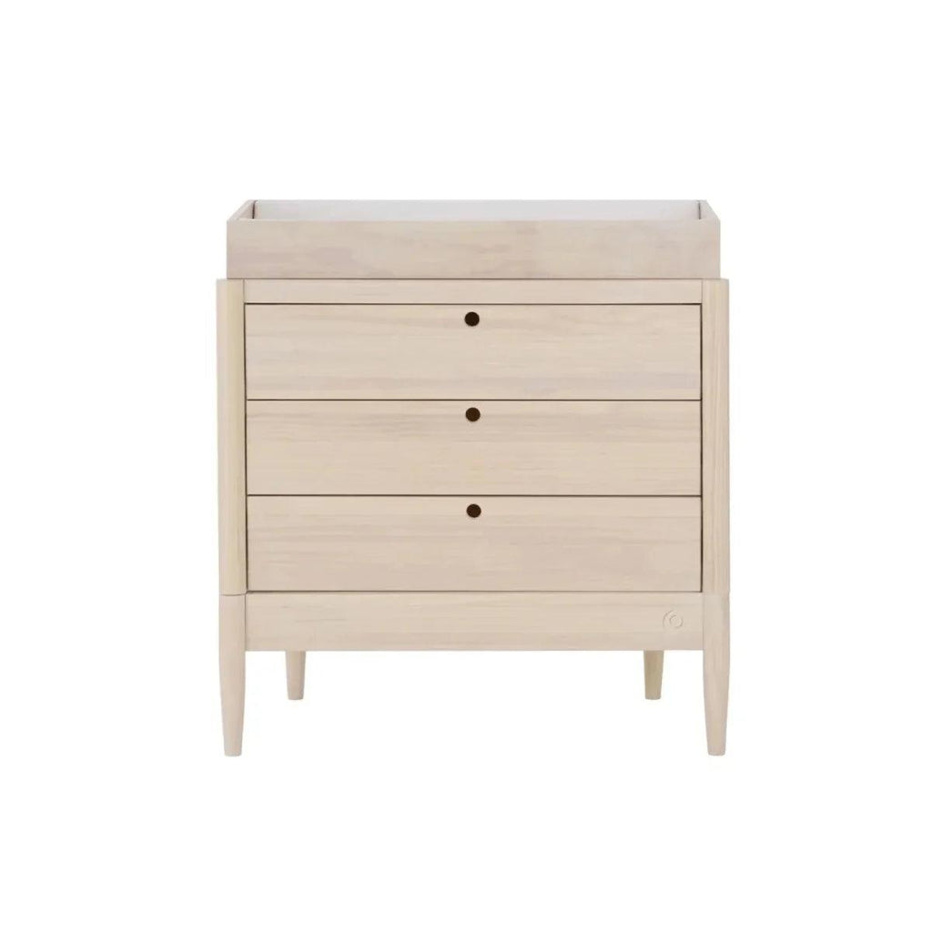 Front view light ash wood baby dresser with three drawers and rounded knobs
