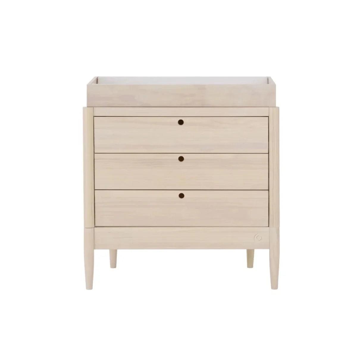 Front view light ash wood baby dresser with three drawers and rounded knobs
