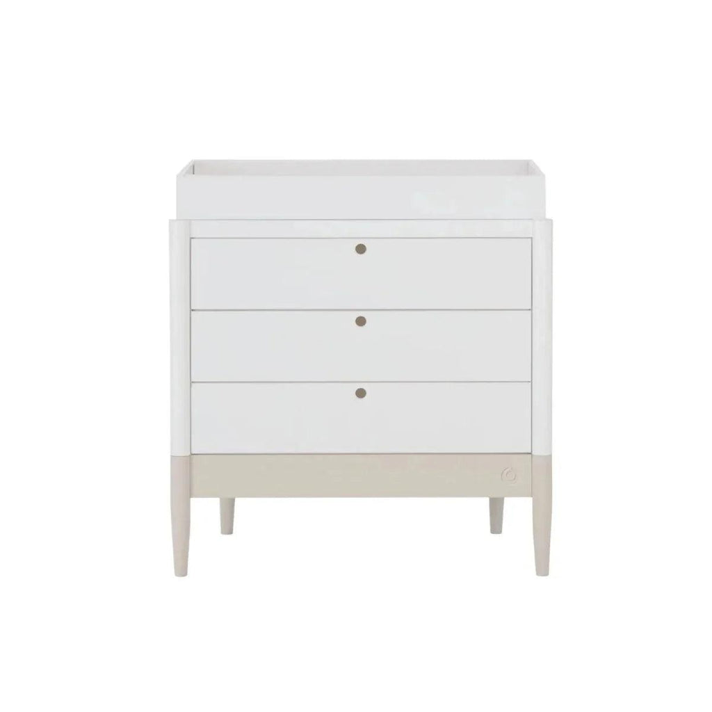 White baby dresser with 3 drawers, desert-sage base band, and round drawer pulls