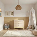 Baby dresser in primrose yellow and natural ash, three drawers, dark knob pulls.